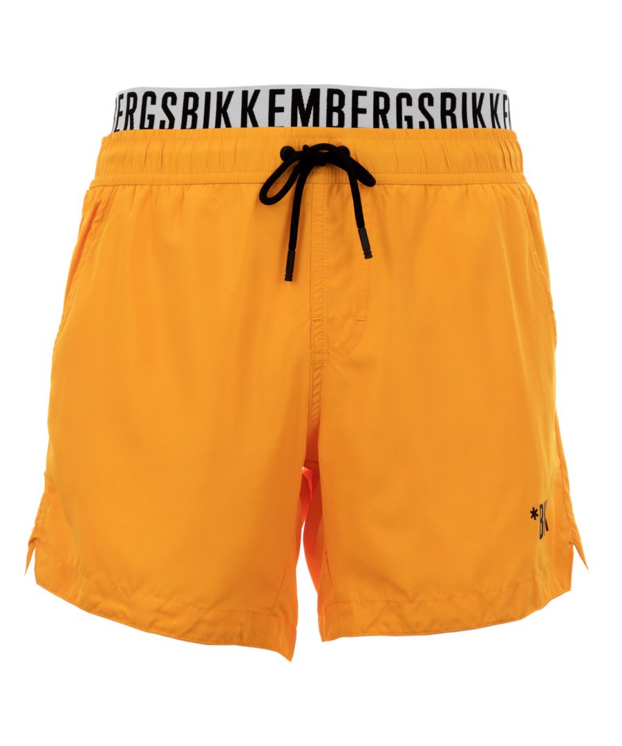 Bikkembergs BKK1MBS03-ORANGE-XL The Bikkembergs brand finds inspiration in the union between the creativity of fashion and the functionality of sport. The fashion house, founded in 1986 by the eponymous designer and member of the group of avant-garde designers known as the 