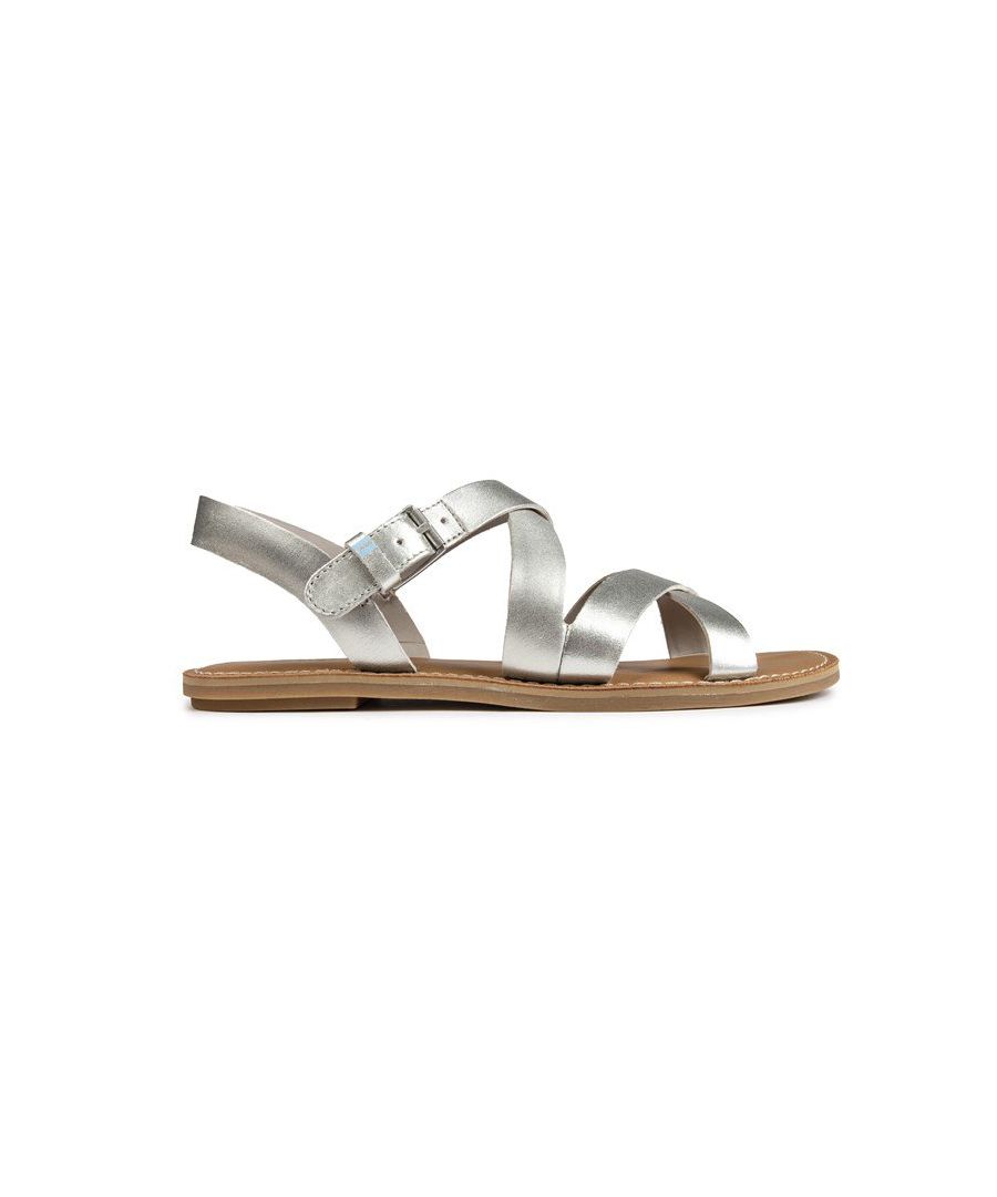 Womens metallic Toms sicily sandals, manufactured with leather and a rubber sole. Featuring: cushioned leather insole, lightweight construction, buckle closure and silver metallic.