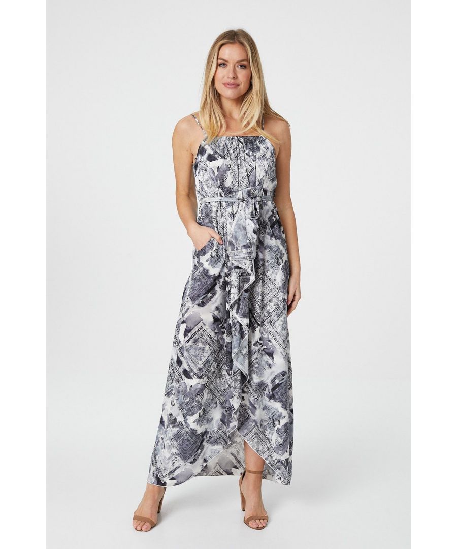 Update your warm weather dress collection in this ruffle front maxi dress. With a square neck, thin adjustable cami straps, a removable tie detail belt, hidden pockets and a figure flattering high low a-line skirt sitting below the ankles. Pair with nude heels for a dressed up occasion or with sandals for the weekend.