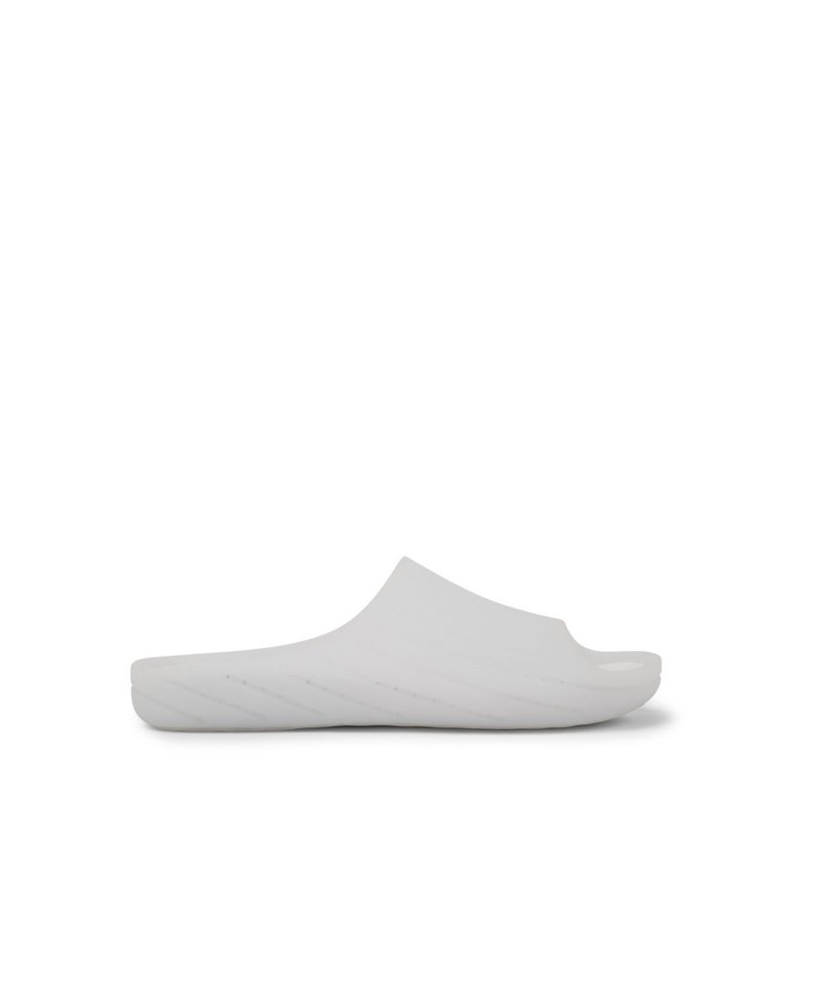 White monomaterial slip-on men's sandals with 100% TPU outsoles (20% recycled) and PU removable footbed. Fully recyclable. \n\nOriginally created to reduce materials and eliminate complex production processes, our iconic Wabi represents our decades-long push toward becoming more sustainable and circular.