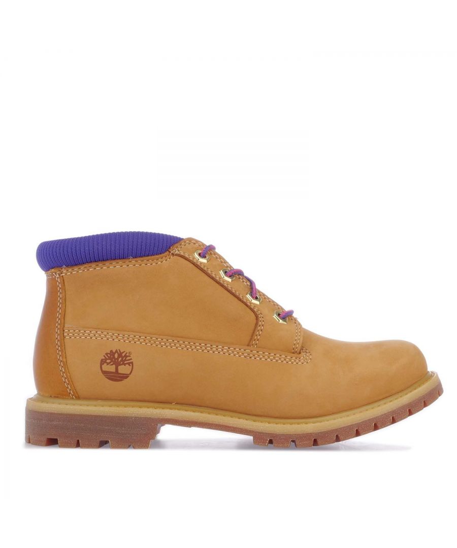 Womens Timberland Nellie Chukka Double WP Boots in wheat.- Upper made with waterproof Better Leather from an LWG Silver-rated tannery. - Lace-up fastening.- Padded cuff. - Round toe. - Textured tread.- Anti-fatigue removable footbed. - Seam-sealed construction.- Rubber lug outsole.- Ref: CA2JSJ