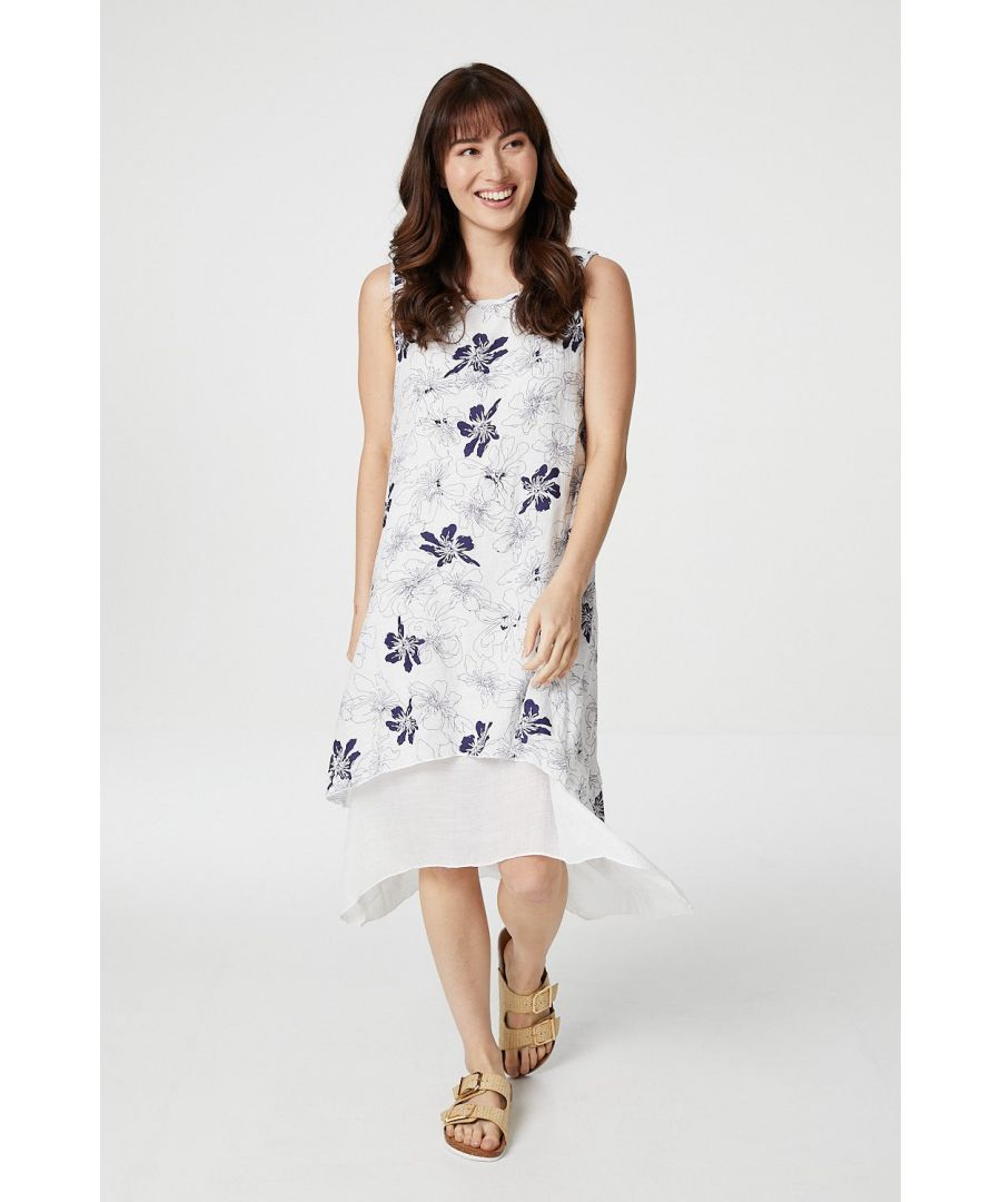 Every dress collection needs a lightweight tropical print swing dress for casual summer weekends and holidays. With a round scoop neck, wide cami straps, a relaxed fit and an asymmetric layered hem sitting below the knee. Pair with low sandals for a dressed down daytime look.