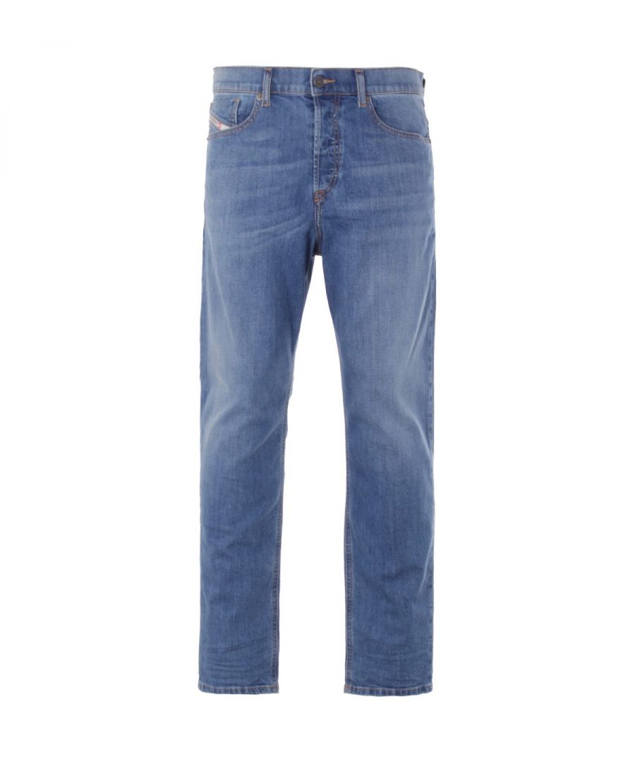 Defined by a casual attitude and designed to suit different body types the 2005 D-Fining Tapered Jeans from Diesel boasts a contemporary silhouette. Crafted from BCI cotton denim with added stretch, ensuring all day comfort and ease of movement. Featuring a traditional five pocket design with a button fly fastening and contrasting lighter areas and dirt effects that channel a natural, lived-in look. Finished with signature Diesel branding.BCI - By buying BCI cotton products, you\'re supporting more responsibly grown cotton through the Better Cotton Initiative.Regular Tapered Fit, Stretch BCI Cotton Denim, Five Pocket Design, Button Fly Fastening, Belt Looped Waist, Light & Dirt Effects, Diesel Branding. Style & Fit:Regular Tapered Fit, Fits True to Size. Composition & Care:98% Cotton, 2% Elastane, Machine Wash.