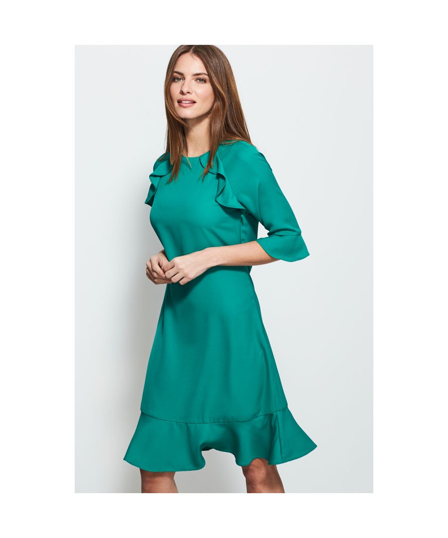 REASONS TO BUY: \n\nA shift with a twist\nBody-skimming design: comfy and chic\nPretty ruffle trim to front, sleeves and hem\nEmerald shade you'll wear year-round\nWear it with metallic heels for special occasions\nStyle with chic court shoes for work