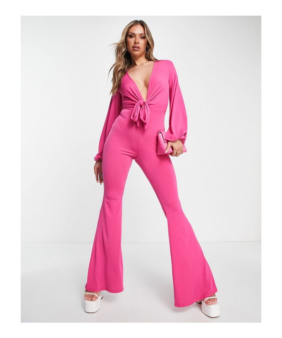 Jumpsuit by ASOS DESIGN No need for a dress to impress Plunge neck Long sleeves Tie front Flared leg Slim fit  Sold By: Asos