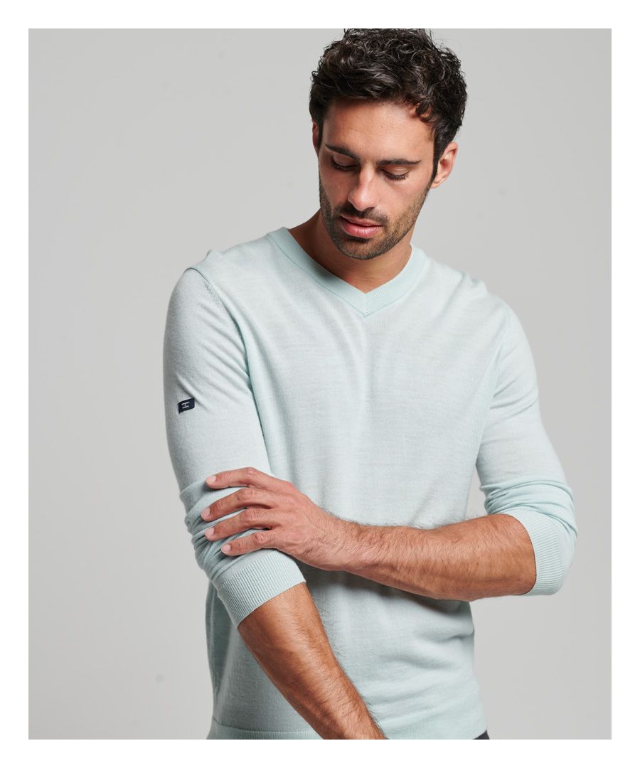The Merino V-Neck Jumper is made from luxurious Merino wool for a sophisticated and premium look and is an ideal choice this season.Relaxed fit – the classic Superdry fit. Not too slim, not too loose, just right. Go for your normal size.V-neckLong sleevesGenuine Merino woolRibbed cuffs and hemSignature branding