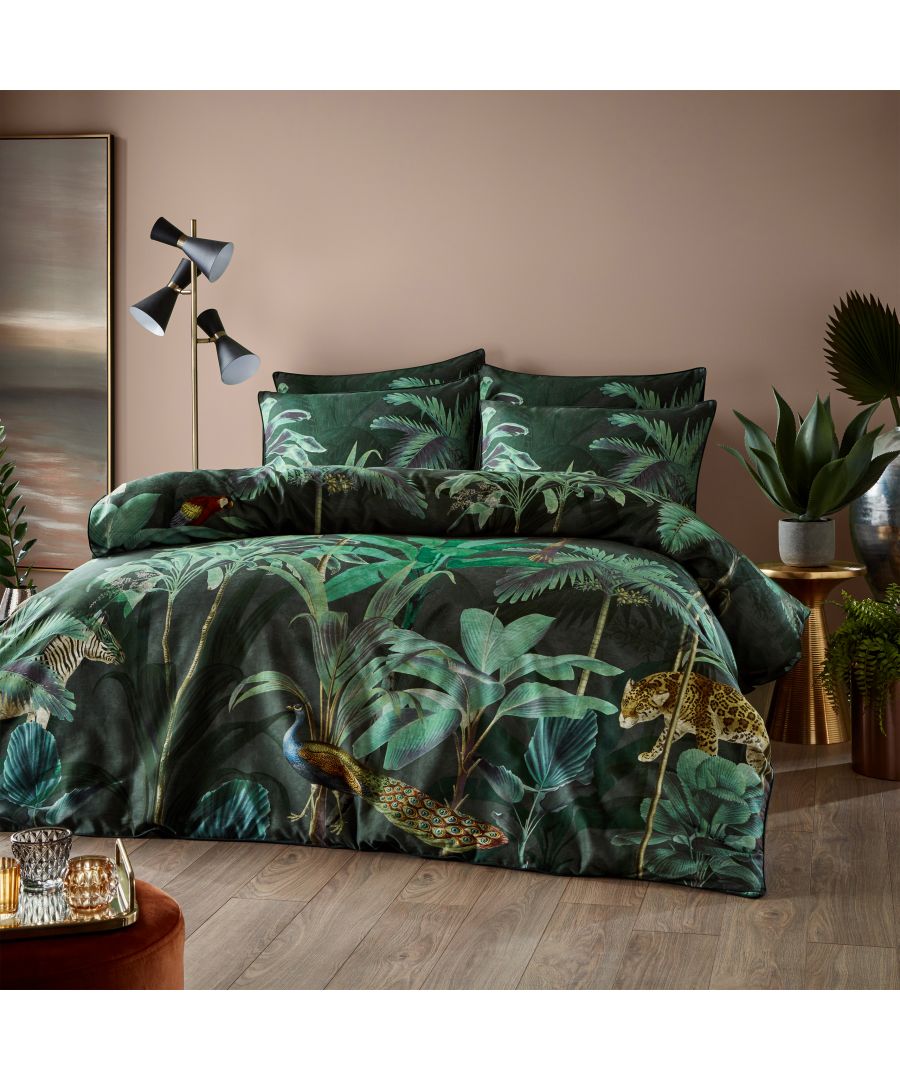 Take a trip to the wild side with a display of exuberant wild animal and birds, each on their trails through rich teal green leaves. The print sings with their call and the rustling of the flora. Rendered against a midnight green nightscape, enhancing the magic of the moody scene. They feature a plain, tonal colour reverse that compliments the print. Includes 2 x pillowcases measuring 50 x 75cm.