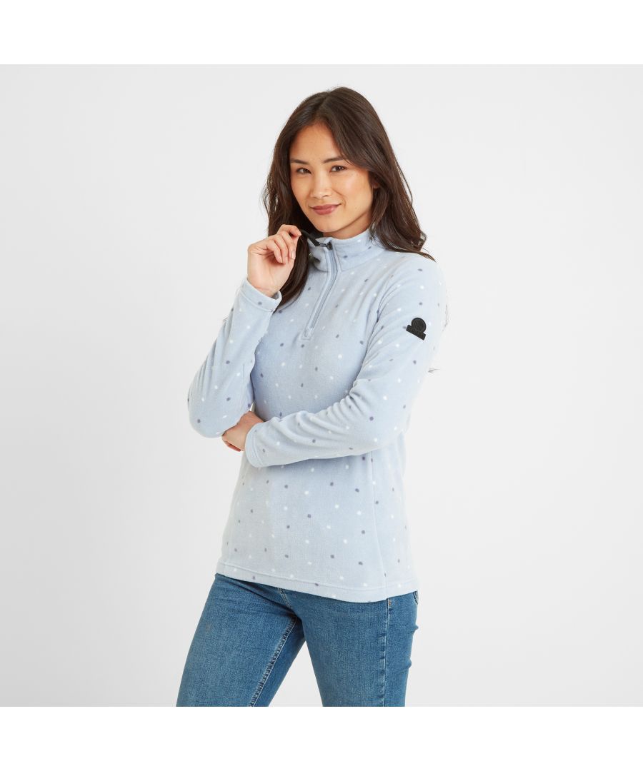 Supersoft, lightweight, warm and cosy, our Shepley microfleece is ideal to team with jeans for a brisk walk across the Yorkshire moors, or to wear as a mid-layer over gym clothes and under a coat when it turns colder. Shepley comes in a fun, all over, irregularly spaced polka dot design, which is printed into the pile so it won't wash out, and this lifts it out of the ordinary. The fabric is anti-pill, meaning that it has been treated to prevent little bobbles building up on the surface. This zip neck fleece is lightly brushed on the inside for a fluffed up feeling that's cosy and soft, so it feels great on too. The finishing touch is our embossed rubber TOG24 badge on the sleeve.