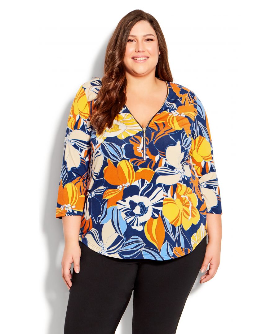 Instantly sophisticated, stay in style with the Flower Zip Top. The zip neckline creates a sleek touch to this relaxed blue top, finished with a colourful floral print and relaxed silhouette. Key Features Include: - V-neckline with workable zip - Elbow length sleeves - Relaxed fit - Darted bust for shape - Curved hip length hemline - Stretch fabrication