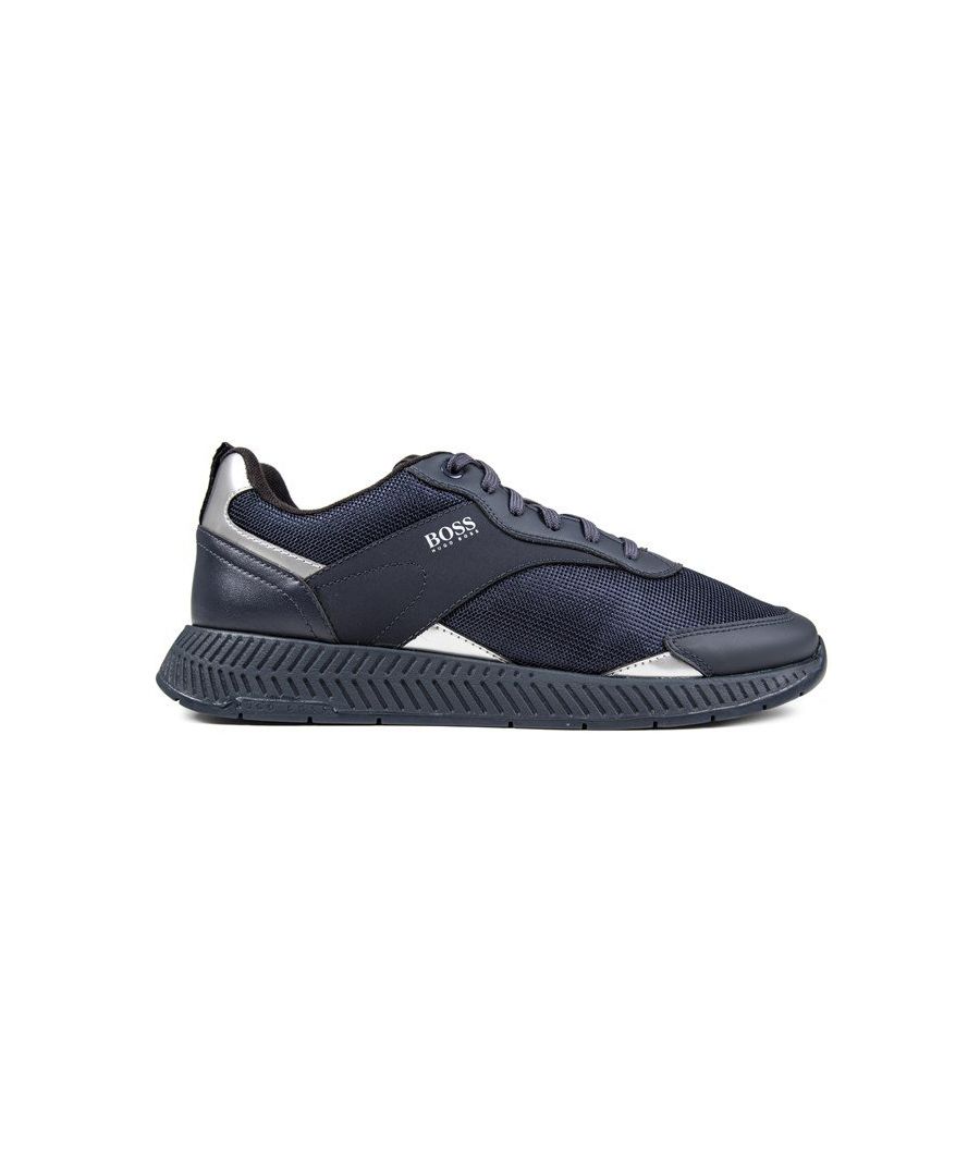 Luxe Up Your Look With The Titanium Runn Men's Trainers From Boss. Boasting A Striking Nylon Mesh Upper Featuring Invisible Eyelets, Metallic Silver Accents And Branding, This Futuristic Navy Performance Sneaker Is Finished With Nylon Lining And A Chunky Durable Rubber Outsole.