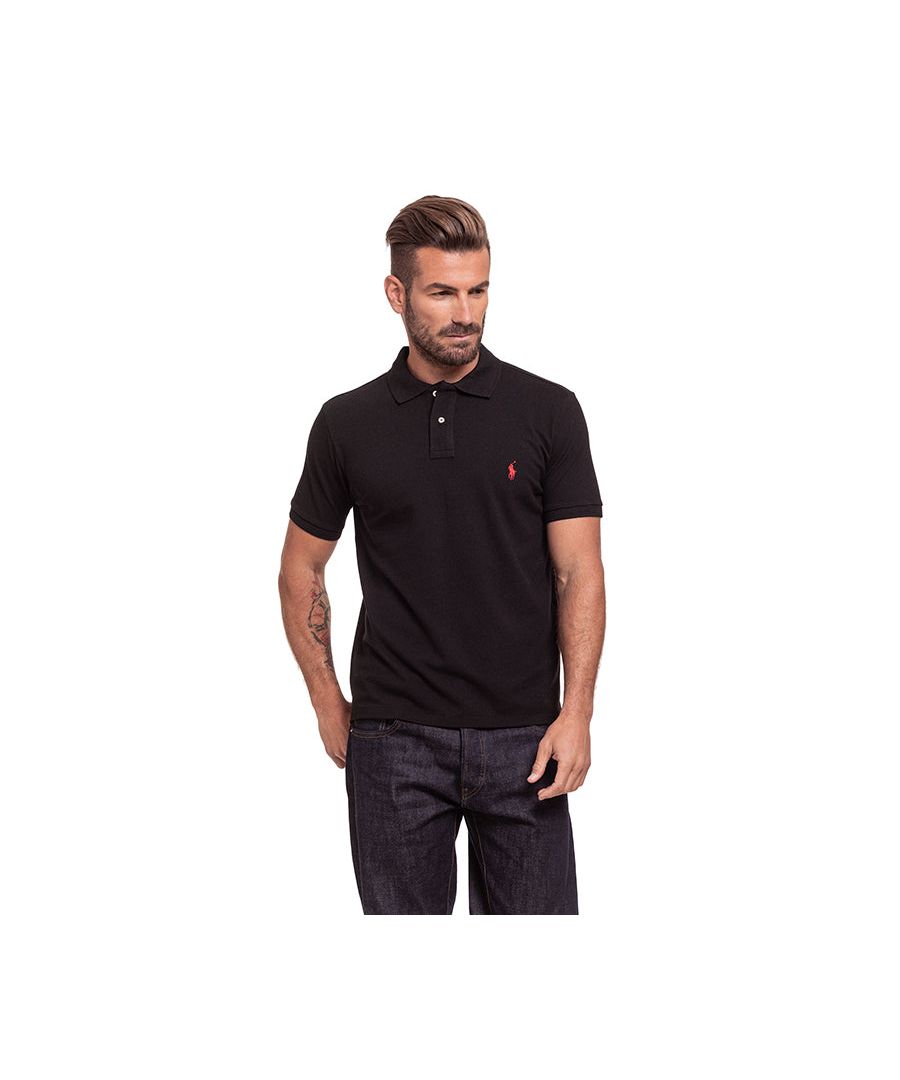 Ralph Lauren Short Sleeve Polo in Black | 100% cotton. These original men's designer short sleeve Ralph Lauren polos feature the brand's logo and a button-down collared neckline. Crafted With 100% cotton, these lightweight and breathable regular fit polos are suitable for casual or workwear.