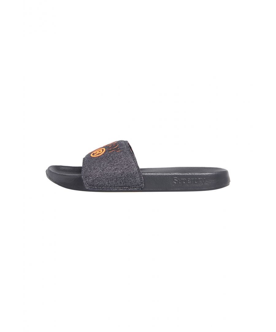Superdry men's Lineman pool sliders. A must have for around the pool this season, these sliders feature a wide front strap and moulded sole for your comfort. The Lineman pool sliders are completed with logo detailing on the strap and side of the sole.S - UK 6-7, EU 40-41, US 7-8M - UK 8-9, EU 42-43, US 9-10L - UK 10-11, EU 44-45, US 11-12XL - UK 12-13, EU 46-47, US 13-14