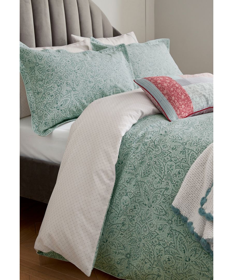 Beautifully timeless this all over stylised paisley floral design is classic and sophisticated. The subtle teal colourway reverses to a small-scale geo pattern on the reverse in serene ivory. Includes Pillowcase(s). Machine Washable. Made in Pakistan.