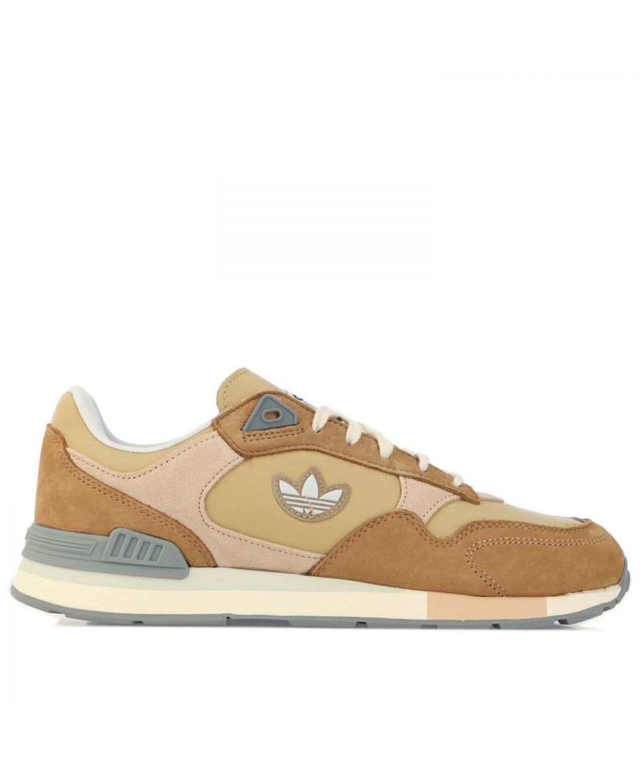 adidas Originals Treziod Trainers in beige.- Leather  suede and textile uppers.- Lace up fastening.- Regular fit.- Trefoil badge.- EVA midsole.- Textile lining.- Rubber outsole.- Ref: GY0728X