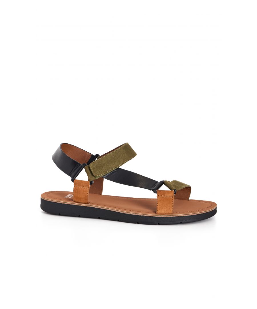 Opt for a trendy touch with the Multi Sporty Strap Sandal, featuring thick strapping and a round open toe. Designed in a comfortable extra wide fit, you'll get plenty of wear out of these stylish sandals! Key Features Include: - Round open toe - Thick strapping - Velcro closure - Thick cushioned sole Team with a pair of cropped jeans, a floaty tunic and cross body bag for effortless weekend wear.