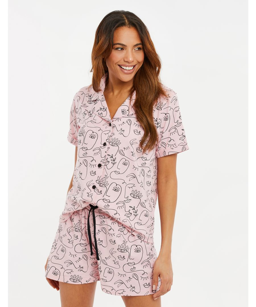 This cotton pyjama set from Threadbare features a short-sleeve button-up pyjama shirt with collar and lapel, and matching shorts with an elasticated waistband and drawstring. Made from cotton fabric to ensure a comfortable feel. Perfect choice for loungewear.