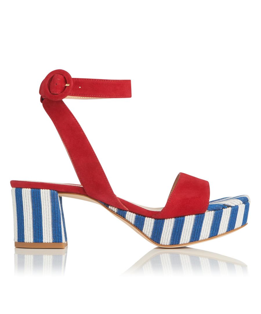 Searching for the perfect fusion of comfort and style? Meet Alie, our eye-catching platform sandals, thoughtfully crafted with a practical mid heel and designed in soft red suede with an eye-catching stripe detail. A must on special occasions or on relaxed days with denim.