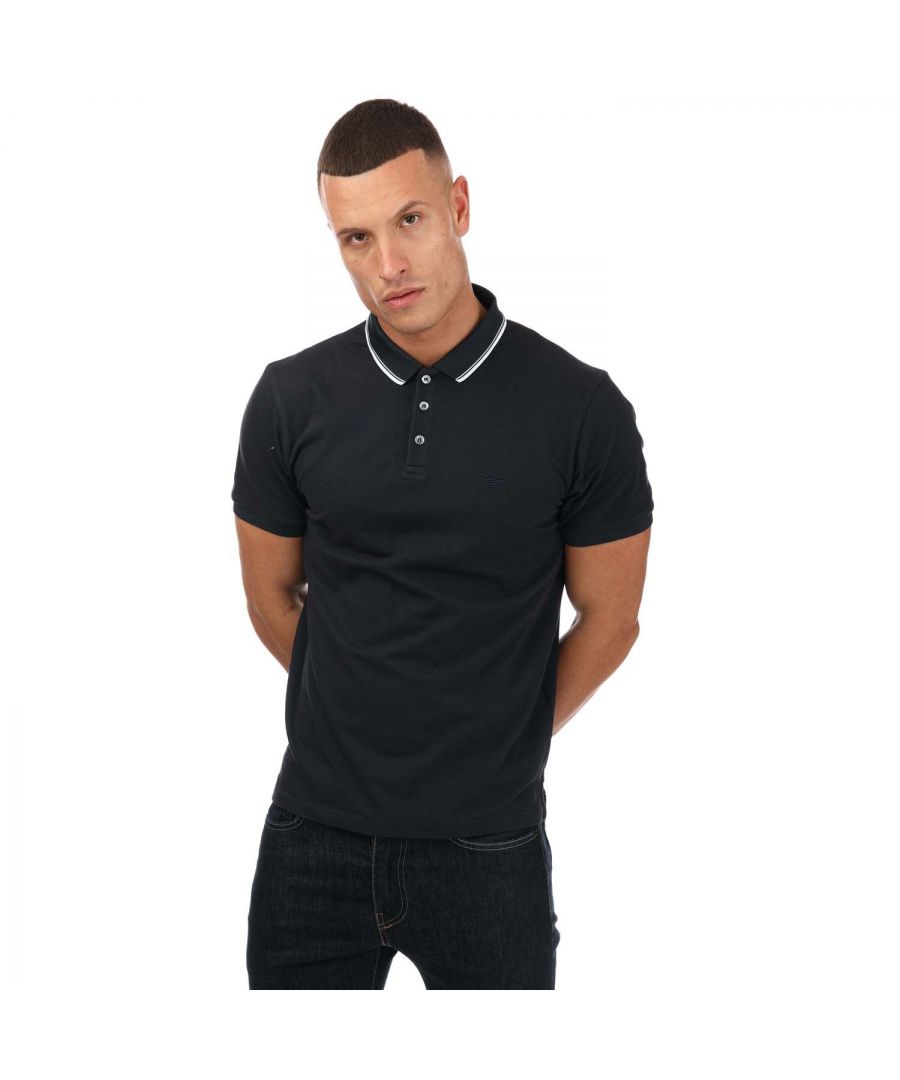 Mens Armani Tipped Detail Polo Shirt in navy.- Polo  collar.- Short sleeves.- Three-button placket.- Ribbed detail on collar and cuffs.- Tipped detailing to collar.- Iconic logo to the chest.- Side slit hemline.- Fabric: 95% Cotton  5% Elastane. Rib Details: 100% Polyester.- Ref:3H1F82J60Z0922