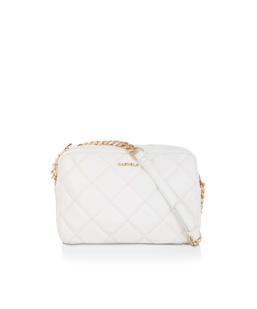The Bloom Quilt Cross Body Bag features a white exterior with classic, gold tone Carvela branding on the front. Magnetic snap pocket on the back. Dimensions: 16cm (H), 25cm (L), 6cm (D) Strap length: 140cm Strap drop: 63cm.
