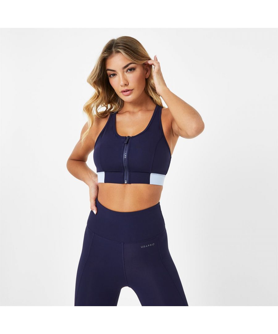 This USA PRO sports bra is the ultimate modern must-have. Designed with zip detailing for a contemporary twist, this exercise-ready essential is a true favourite, this season and beyond. Complete with contemporary contrasting at sides for that nod to athleisure style and crafted in Pro-dry fabric for the ultimate comfort during your workout. And, why not complete the sporty look with matching panel leggings?  >Classic fit  >Zip detail  >Block panel detail  >Racer back detail  >Pro-dry  >78% nylon, 22% elastane  >Machine washable