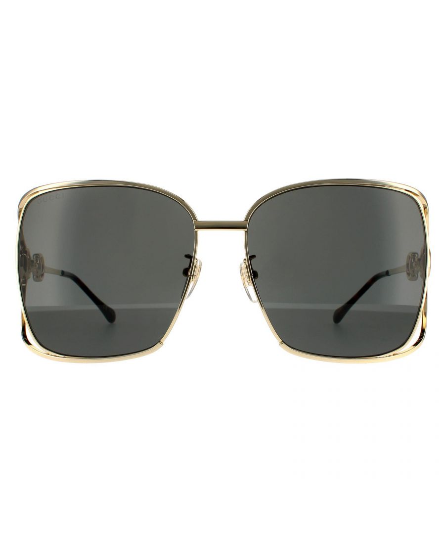 Gucci Sunglasses GG1020S 002 Gold Grey are a large oversized style with a rectangle shaped frame featuring the interlocking GG Gucci logo on the hinges for that authentic Gucci look. The adjustible nose pads and plastic temple tips allow for a personalised fit.