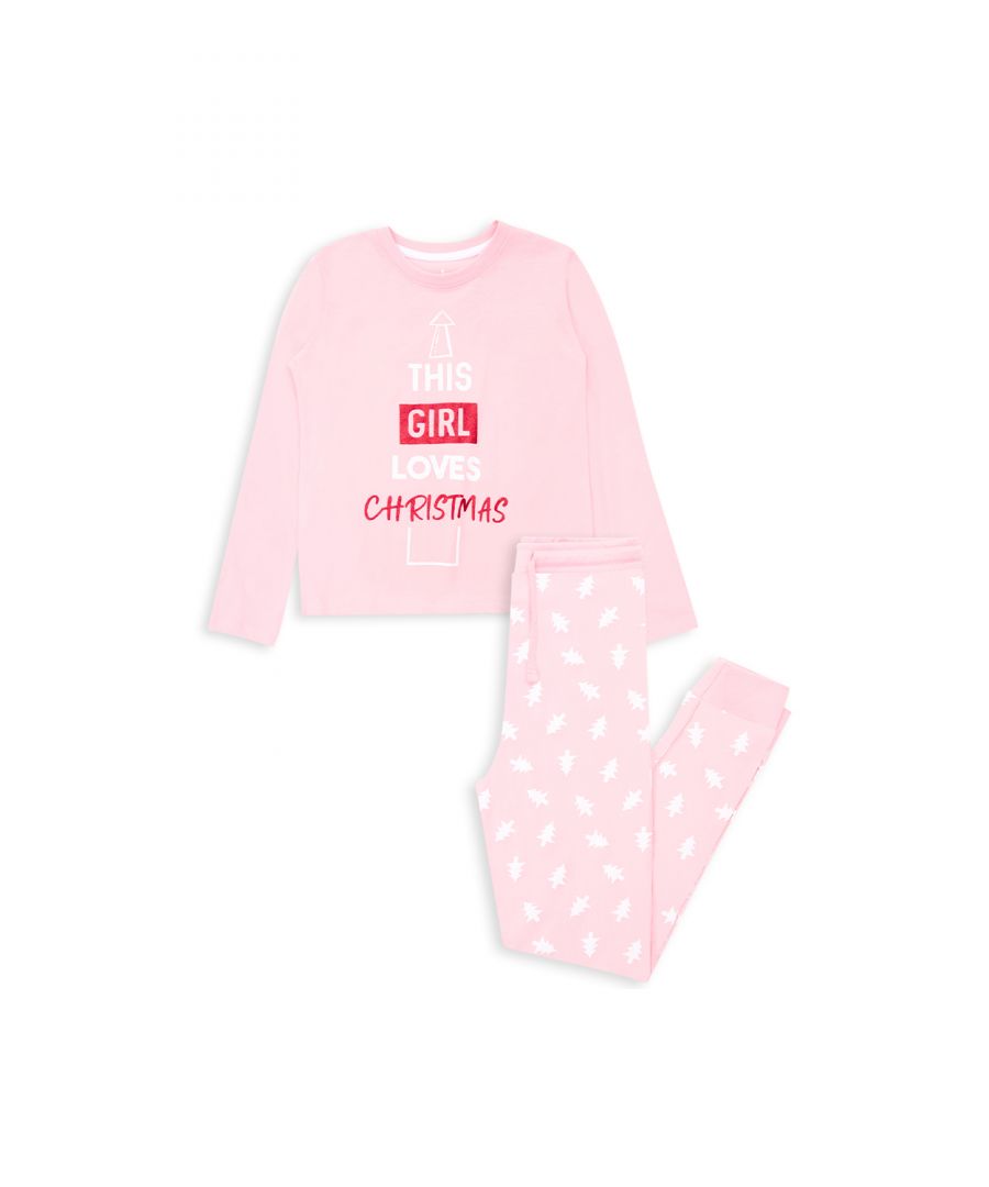 Get in the festive spirit with this cotton pyjama set from Threadgirls featuring a long sleeve top with front print and printed tapered cuffed long bottoms with pockets. The bottoms have an elasticated waistband and drawstring, made from a cotton fabric to ensure a comfortable feel and easy washing. Matching family styles available across men's, women's and girls, perfect for that coordinated family look.