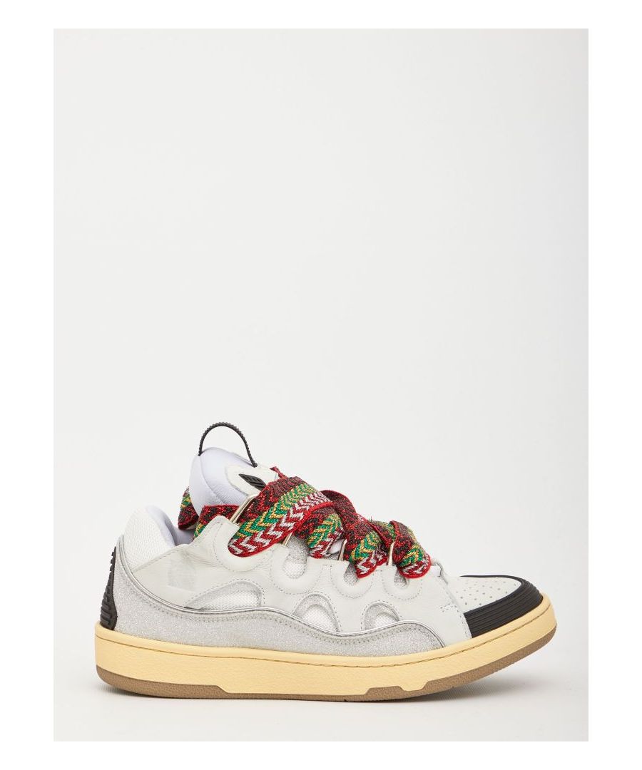 Oversized-design Curb sneakers in white nappa calfskin leather with black inserts on toe and on heel and silver glitter insert. They feature multicolour lurex maxi lace-up closure, padded tongue with Lanvin Paris logo and rubber sole.