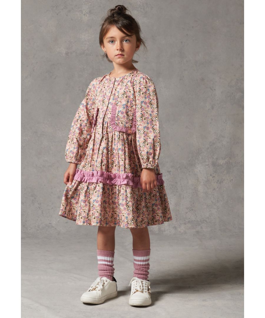 Incoming: Pretty prints. Make this ditsy dress your new favourite. Tiered skirt with ruffle trim patch pockets and button front it’s a must!   Angel & Rocket cares – made with fairtrade cotton   Dusky Pink    About me: 100% cotton.   Look after me: think planet  machine wash at 30c
