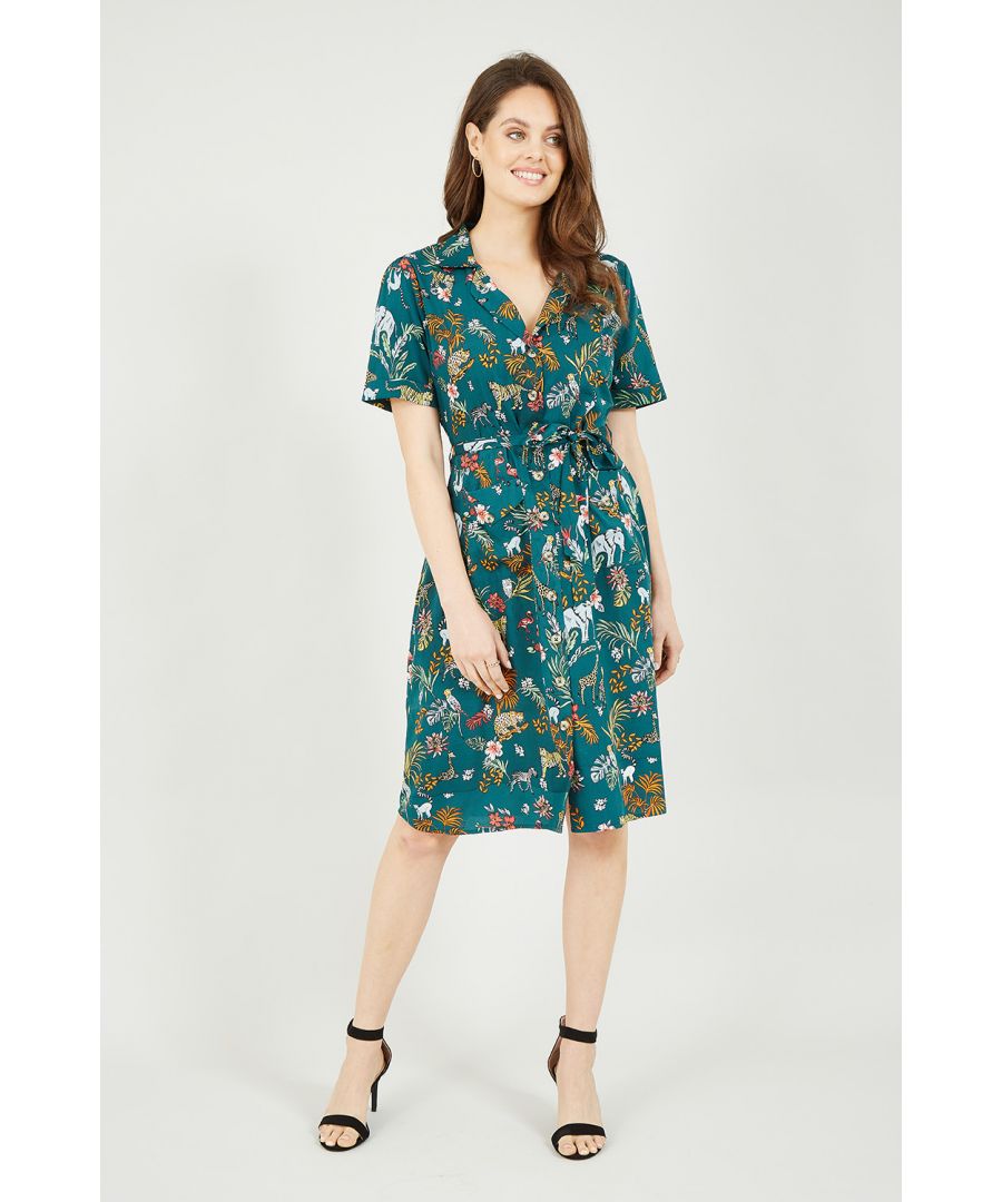 Welcome to the jungle. Step into spring/summer styles in this stunning Yumi Green Animal Kingdom Print Shirt Dress. In a deep green, this super flattering dress comes with a button up fastening, waist tie belt, striking print and shirt style short sleeves. Match with strappy heels or ankle boots and a leather jacket to complete the look.