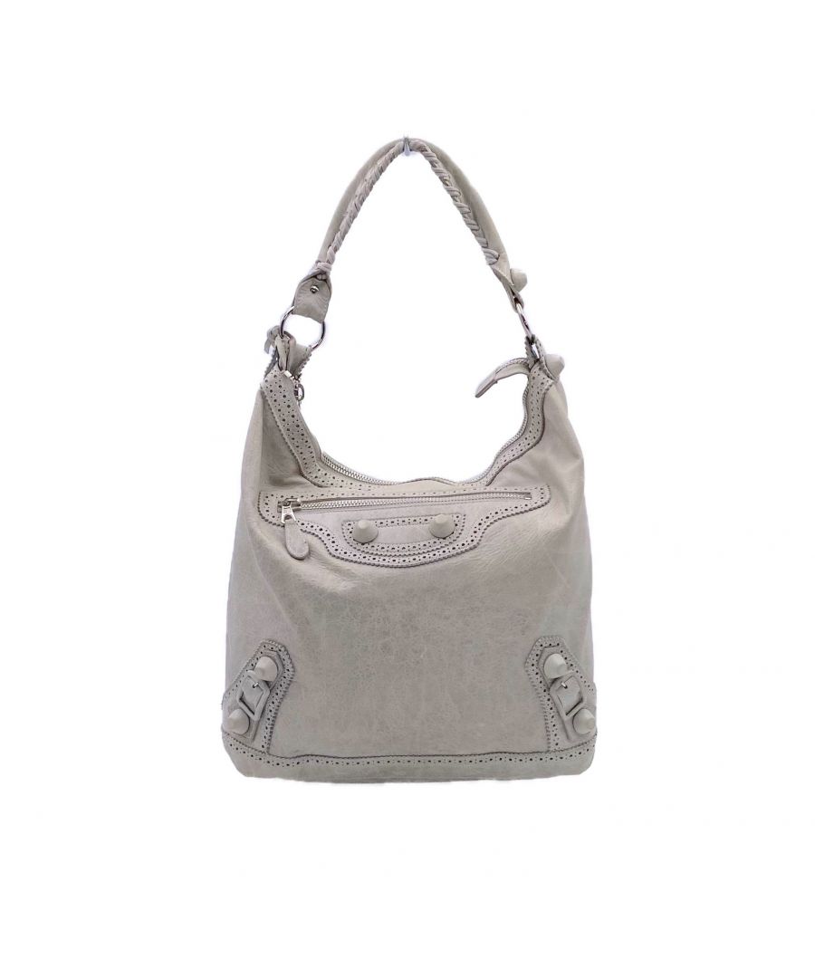 VINTAGE. RRP AS NEW. Elevate your style with this beautiful and timeless Balenciaga classic! Your perfect go to bag for everyday use as a lovely biker chic bag.\n\nWith a soft rugged feel and crafted in distressed green lambskin leather, the outer is embellished with unique giant-sized covered studs and a front zip pocket that can easily fit your mobile phone. Also with hanging hand-mirror on leather strap.\nThe handles are hand stitched and double rolled for comfort.\n\nSecured with a zipped closure, the inner is lined with black fabric; featuring a zipper pocket with space large enough to be a small travelling bag. Plus you’ll never feel awful when it drops as it doesn't mark easily, so you’ll love it to death.\n\n32 x 30 x 15 cm. Handle drop: 26 cm - enough room to wear on the shoulder. Code: 204527213048\nExcellent condition (9/10). Gently used, with some light scuffs. Clean interior and free from odour.