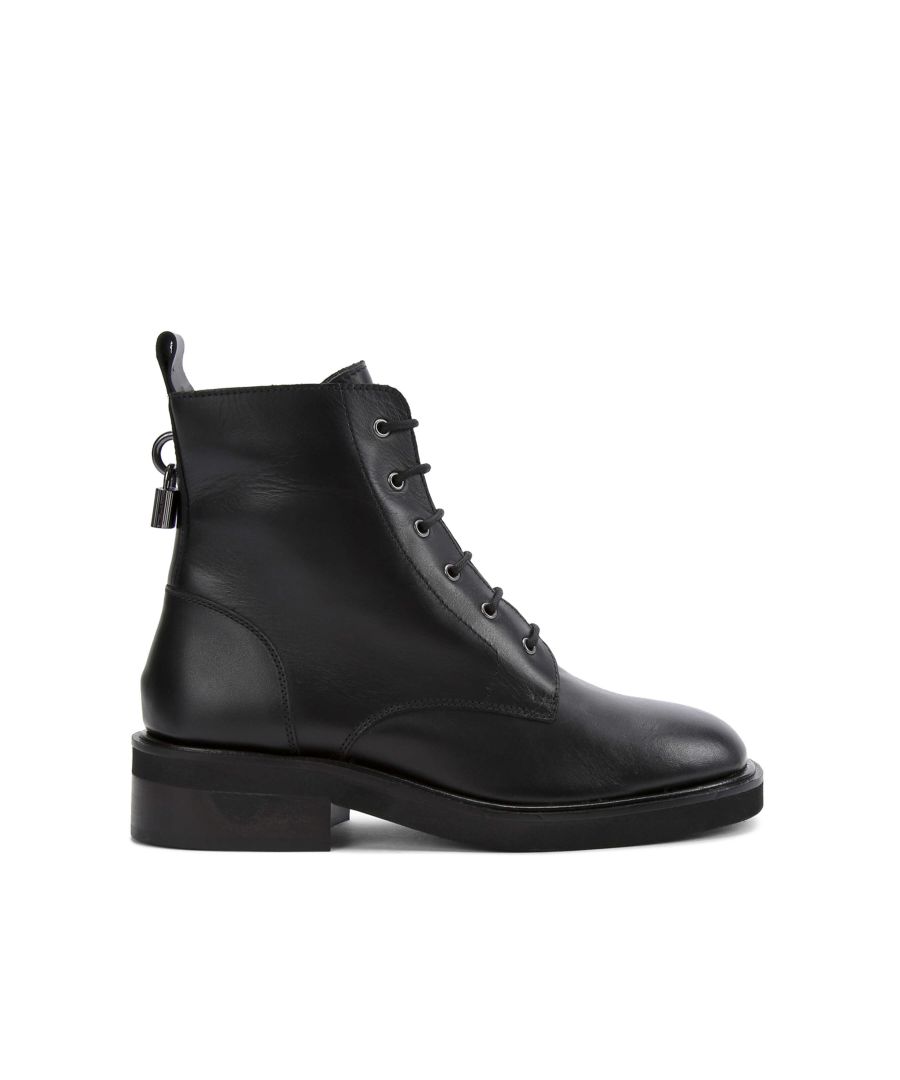 This Lock Lace Up ankle boot arrives in black leather with a classic lace up front. The back of the ankle is accented with gunmetal padlock with embossed logo. Sole height: 40mm. Concealed inner side zip. Material: Leather.