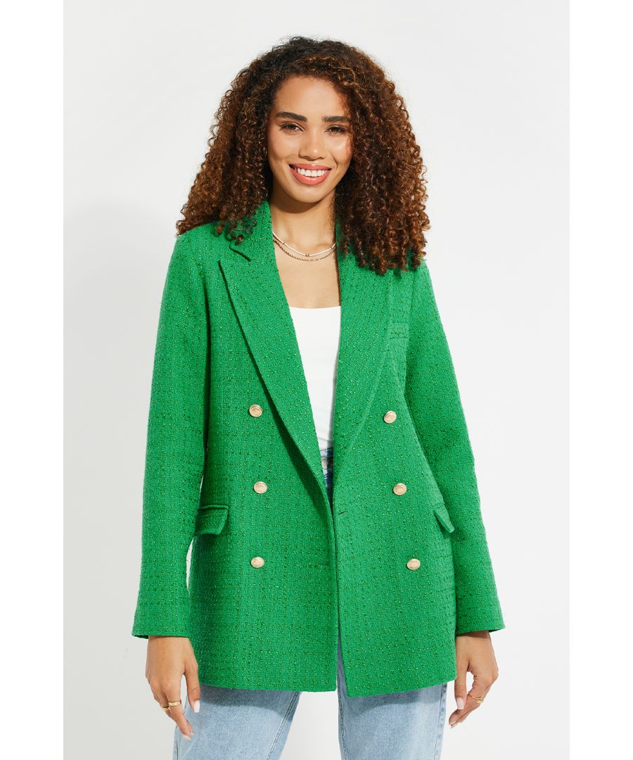 Bring some luxury to your wardrobe with this double-breasted boucle blazer from Threadbare. Featuring a revere collar with lapel, padded shoulders, two front pockets, and a chest pocket. The blazer also has contrasting lining and is finished with military-inspired buttons. This is the perfect piece to add a touch of sophistication to any look. Other colours are also available.