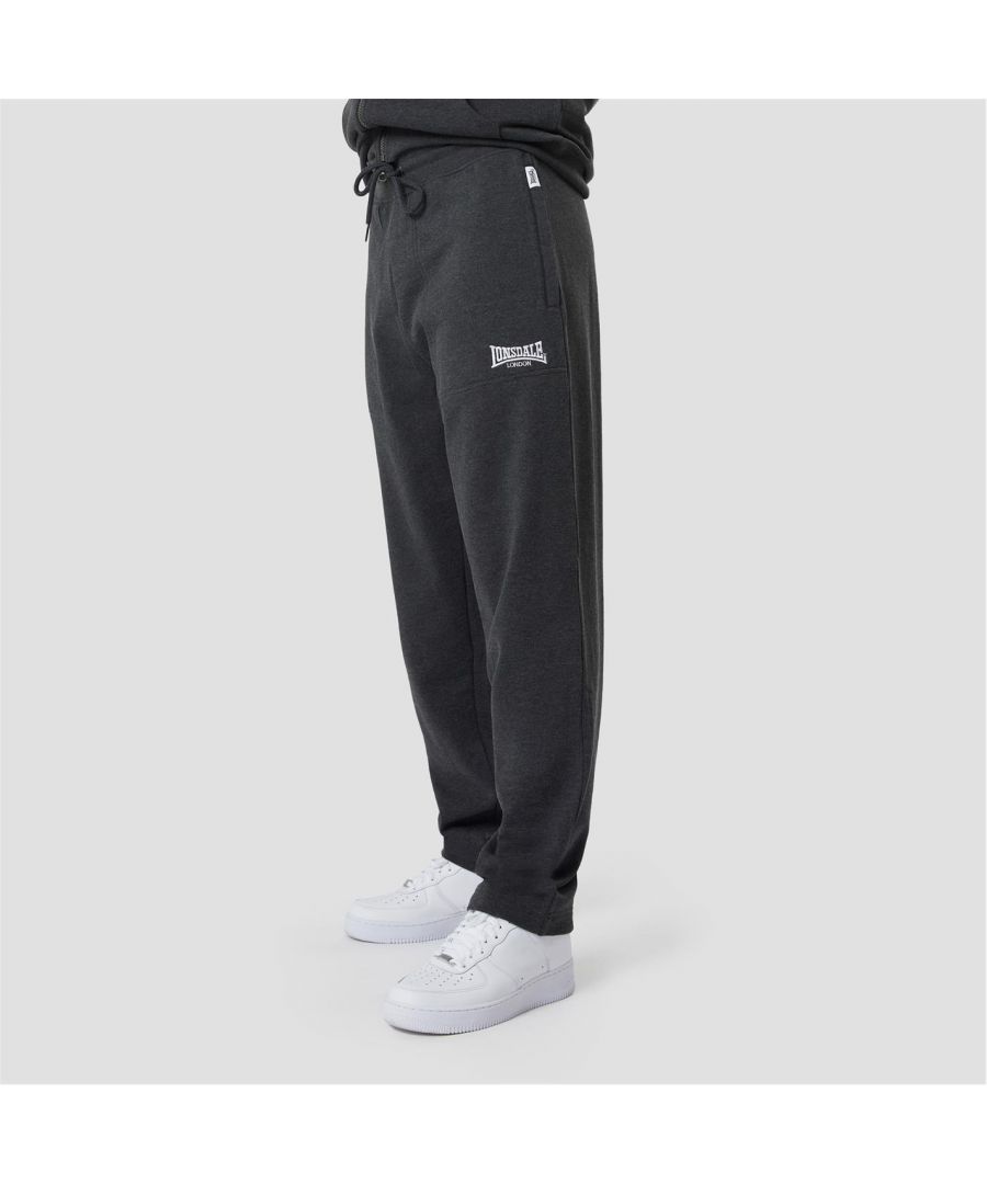 A modern day classic, made for comfort, style and longevity. Crafted from heavy weight cotton rich loopback jersey these best selling joggers are designed for maximum comfort and durability. Cut for a regular fit you'll be stepping out of your house in style whether you're off to training or to the shops. Complete with classic, understated Lonsdale logo embroidered on the leg perfect for a low-key, effortless look. Get the look and wear yours with the Heavyweight Jersey Lounge Hoodie.