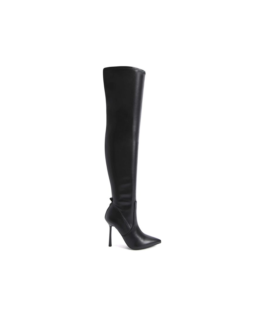 The Stevie is an over the knee boot crafted in black. The back of the ankle features a KG Kurt Geiger logo printed on ribbed textile with a print stitch detailing tab. The stiletto heel is in black. Heel height: 10.5cm. This product is registered with The Vegan Society.