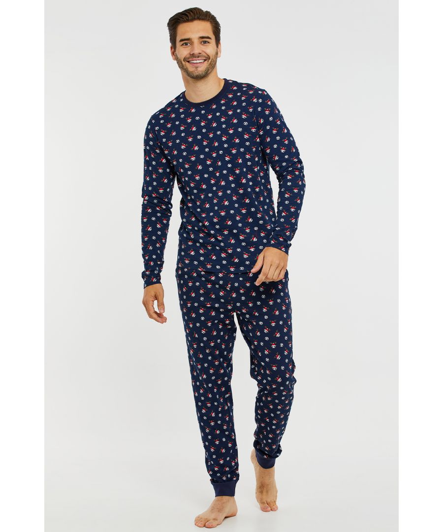 Get in the festive spirit with this cotton jersey pyjama set from Threadbare. It features a long sleeve top with all-over football print and matching printed, cuffed leg, long bottoms with elasticated waistband and drawcord. The soft cotton fabric ensures a comfortable feel and easy washing. Other designs and styles available.