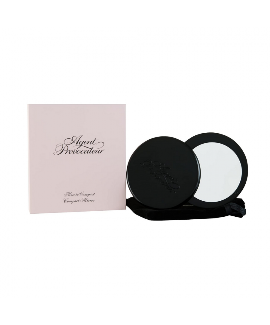 This sleek compact mirror was designed as the handbag essential. Its elegant engraved metallic case makes it easy to use and a velvet pouch will keep it clean and new. A little something for someone you love.