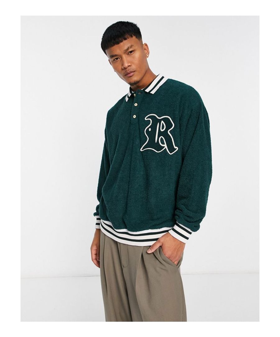 Hoodies & Sweatshirts by ASOS DESIGN Act casual Varsity-inspired design Polo collar Partial button placket Drop shoulders Oversized fit Sold by Asos