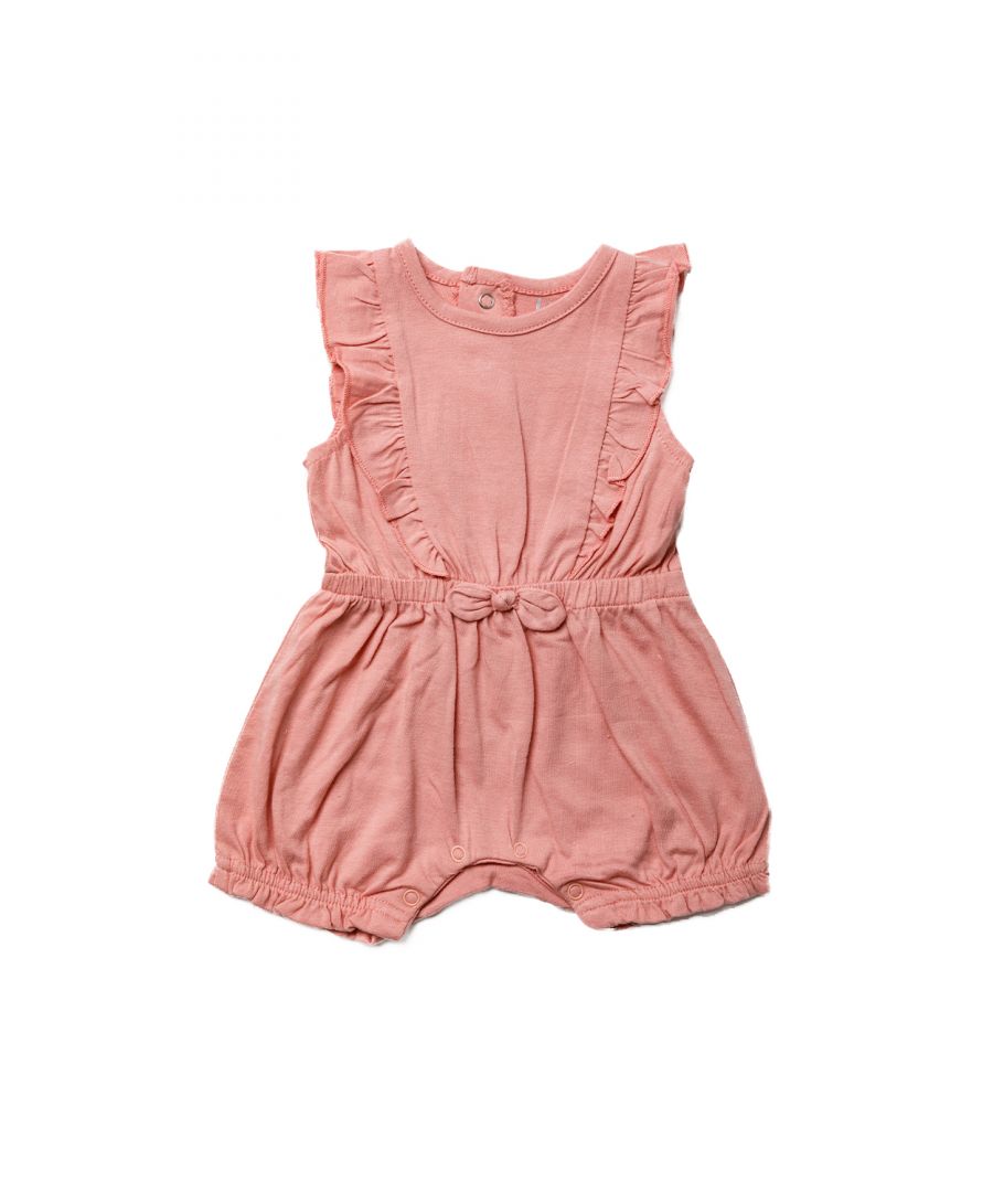 This Miss playsuit is a lovely, simple yet playful style. The arms and legs both have frill detailing and a little bow on the waistband. The playsuit is cotton and has popper fastenings, keeping your little one comfortable. The Miss line captures a playful and pretty style for your little one’s wardrobe, This piece would also make a lovely summer gift.