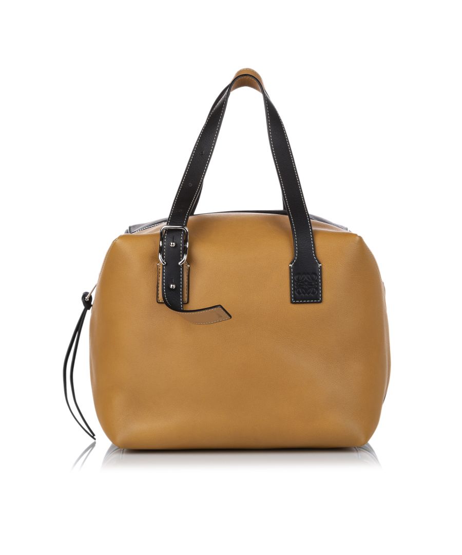 VINTAGE. RRP AS NEW. The Cube satchel features a leather body, flat leather handles, a detachable flat leather strap, a top zip closure, and an interior zip pocket.Exterior Botton Scratched. Exterior Corners Discolored. \n\nDimensions:\nLength 21cm\nWidth 24cm\nDepth 21cm\nHand Drop 19cm\nShoulder Drop 60cm\n\nOriginal Accessories: Shoulder Strap, Dust Bag\n\nSerial Number: 051930\nColor: Black x Brown\nMaterial: Leather x Calf\nCountry of Origin: spain\nBoutique Reference: SSU145303K1342\n\n\nProduct Rating: GoodCondition\n\nCertificate of Authenticity is available upon request with no extra fee required. Please contact our customer service team.