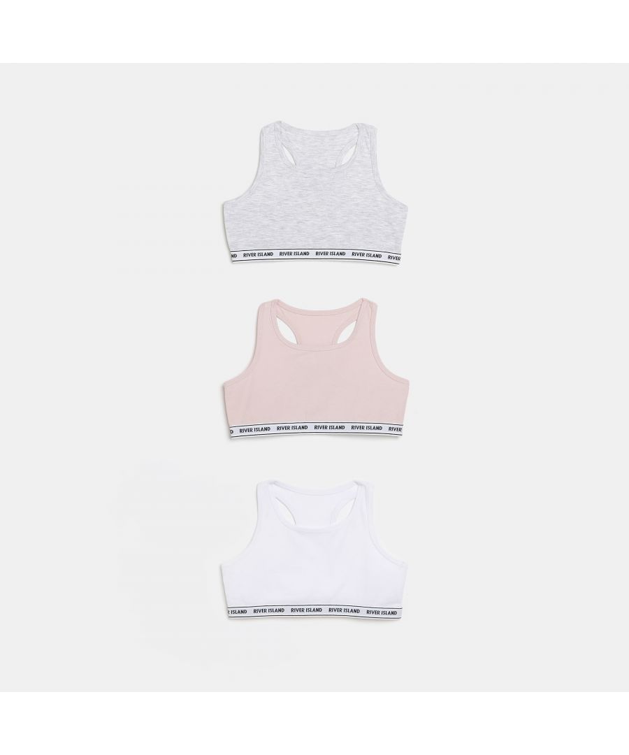 > Brand: River Island> Department: Girls> Colour: Pink> Type: Tank> Material Composition: 95% Cotton 5% Elastane> Material: Cotton Blend> Neckline: Crew Neck> Sleeve Length: Sleeveless> Pattern: No Pattern> Occasion: Casual> Size Type: Regular> Season: SS22