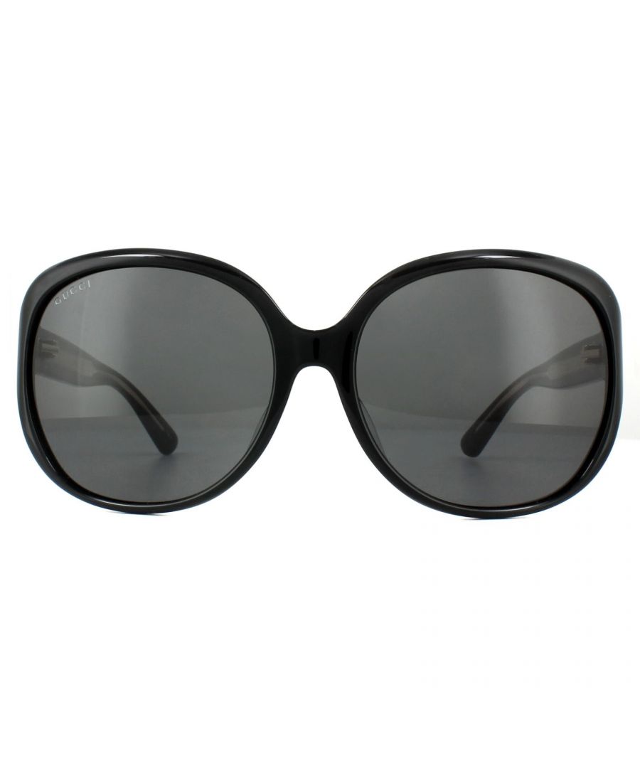 Gucci Sunglasses GG0080SK 001 Black Brown are a large oversized style with the interlocking GG logo at the temples and a visible metal core to the inner temples.