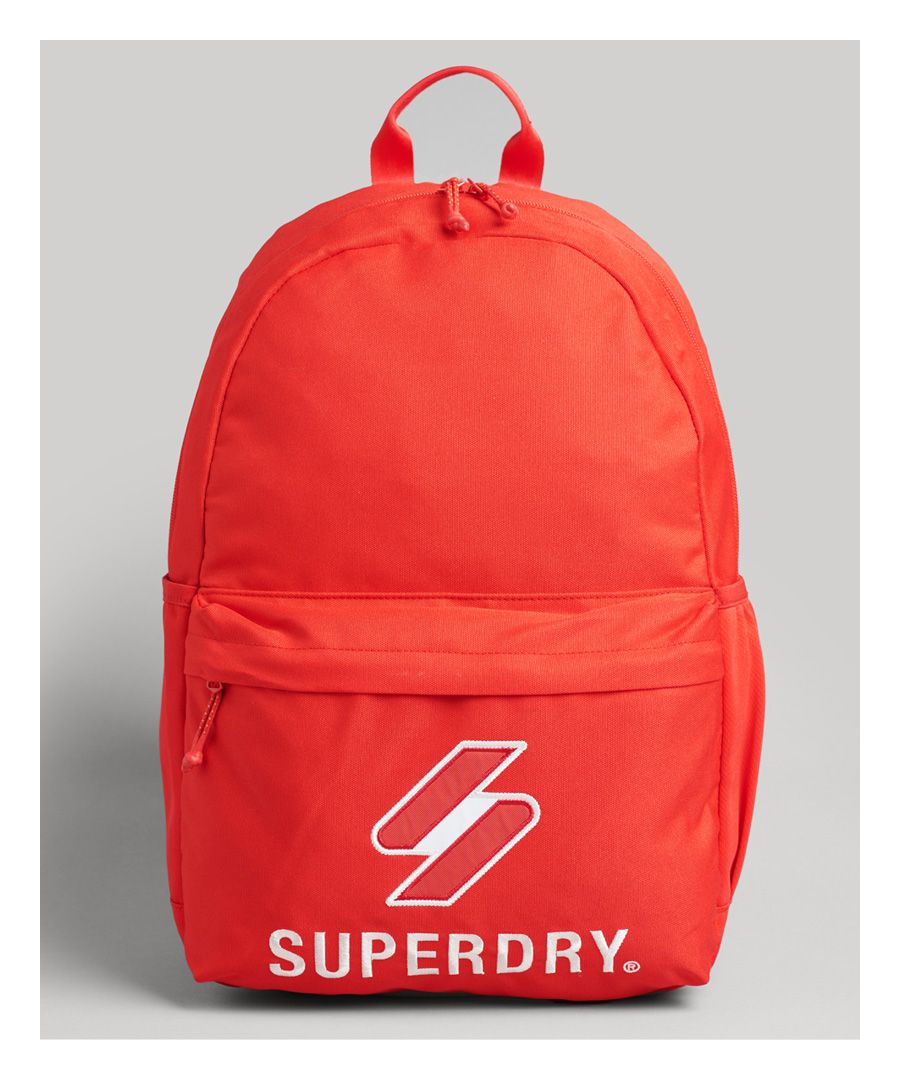 Carry your essentials in sporty style. Our bright Superdry branding is a vibrant way to bring colour to your day-to-day look.Main zipped compartmentTwo side pocketsZipped front pocketAdjustable strapsGrab handleInner sleevesSignature logoH 45cm x W 30cm x D 13.5cm