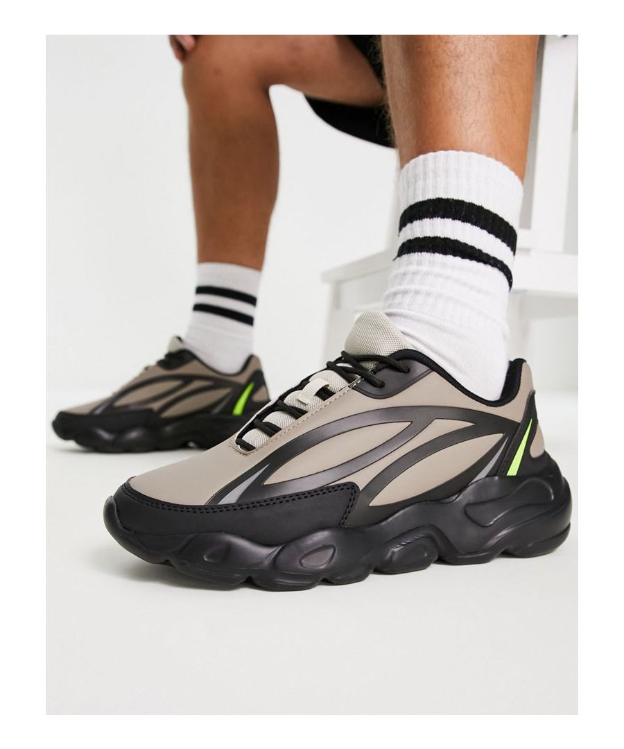 Trainers by ASOS DESIGN Your casualwear companions Low-profile design Lace-up fastening Padded tongue and cuff Chunky sole Textured grip tread Sold by Asos