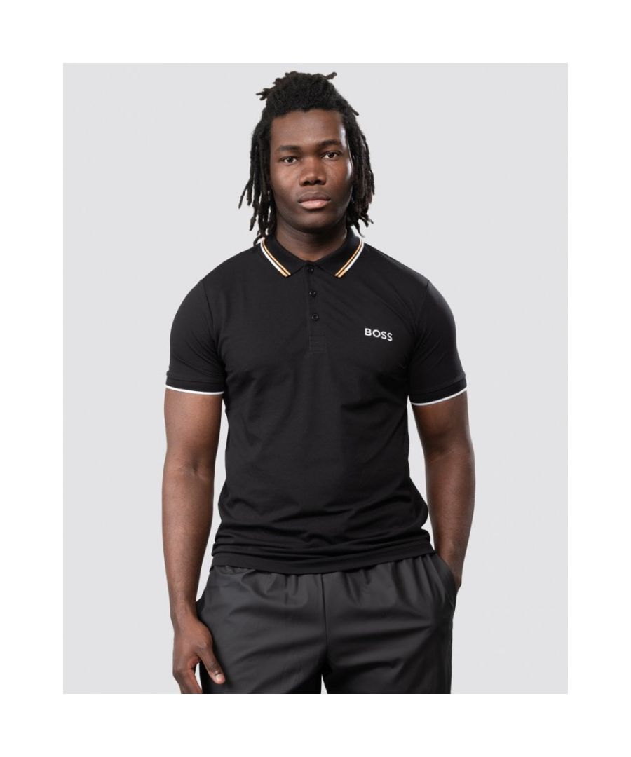 A premium golf polo shirt by BOSS Menswear. Detailed with contrast branding at the back neck and left chest, this short-sleeved polo shirt is cut to a regular fit in cotton-blend piqué with stretch for active movement. The collar and cuffs are trimmed with 3D stripes to deliver an athletic finish.\nRegular fit. Flat-knit collar. Number of buttons: 3. Short sleeves. Flat-knit cuffs. Standard length.\n56% Cotton, 39% Polyester (recycled), 5% Elastane\n50469094