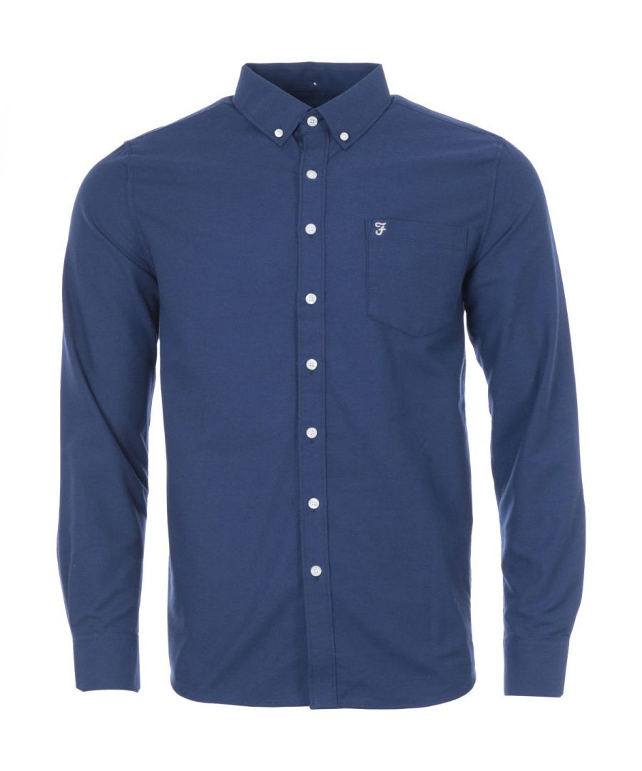 Crafted from a blend of cotton and polyester, the Drayton Oxford Shirt from Farah is fitted with a classic button down collar, full button placket, patch chest pocket and long sleeves with buttoned cuffs. Finished with the iconic Farah logo embroidered at the chest. The perfect shirt to upgrade your wardrobe. Modern Fit, Oxford Cotton Polyester Blend, Button Down Collar, Full Button Placket, Chest Patch Pocket, Long Sleeves with Buttoned Cuffs, Farah Branding. Style & Fit: Modern Fit, Fits True to Size. Composition & Care: 65% Cotton, 35% Polyester, Machine Wash.