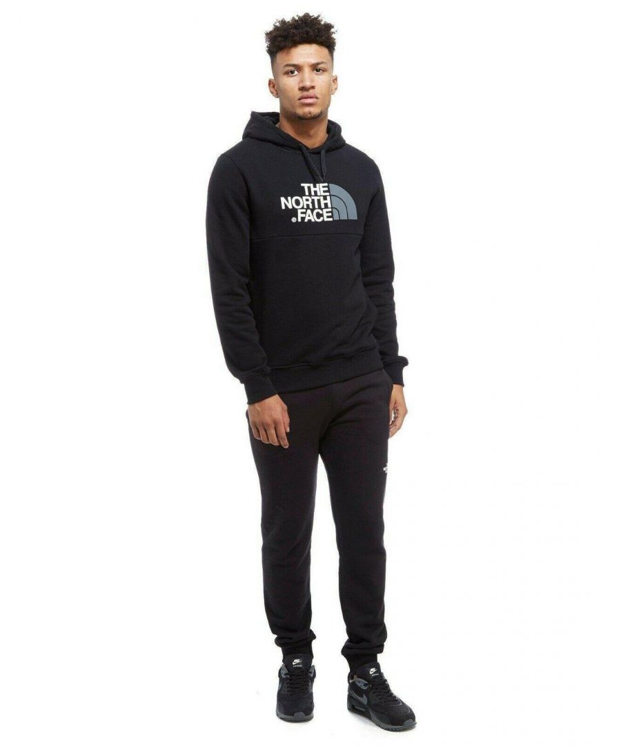 The North Face Mens Full Tracksuit Regular Fit Hoodie Joggers.\nDrawcord Hoodie, Kangaroo Hand Pocket. \nScreen-Rubber Logo Graphic. \nAthletic - style, Ribbed Cuffs and hem.\nElasticated waist with Drawcord.\nCut and Sew Design.\nPremium Quality.