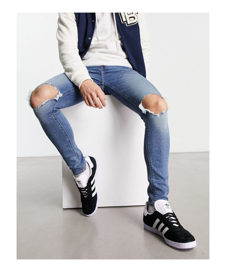 Super-skinny jeans by ASOS DESIGN Waist-down dressing Super-skinny fit Regular rise Functional pockets Ripped knees Sold By: Asos