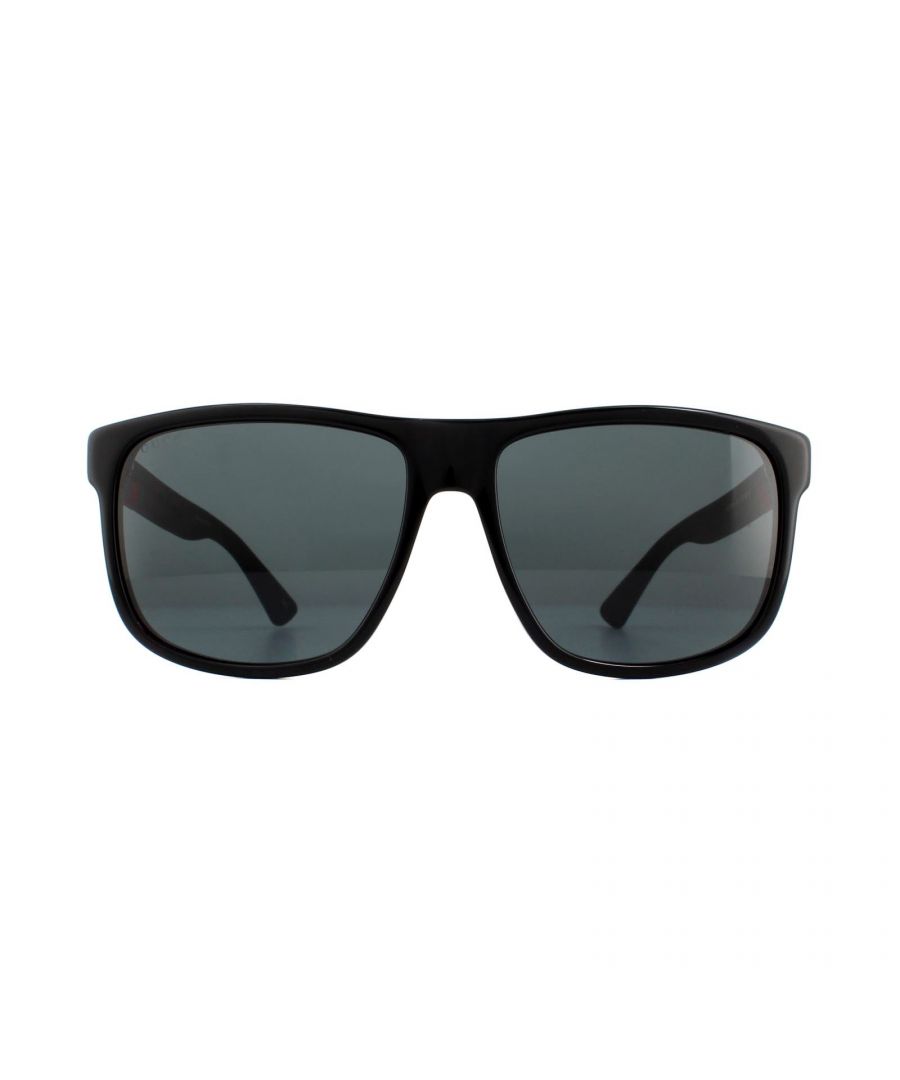 Gucci Sunglasses GG0010S 001 Black Rubber Grey are a sophisticated lightweight D-frame model with bi-chromatic styling. The frame is an easy to wear shape that suits the majority of face shapes and is completed by Gucci's distinctive red and green brand logo.