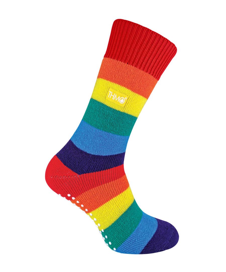 THMO Rainbow Slipper SocksTHMO thermal slipper socks have been made with a heavy bulk acrylic yarn with extreme thermal qualities. They have been double brushed on the inside to maximise warmth by trapping warm air and keeping it close to your feet. This brushing also softens the inside of the sock making it a great choice for indoor relaxing.The funky and bright striped rainbow design of these socks are perfect if you want to jazz up your feet around the house. It also makes them a must-have for your sock drawer.These thermal socks also feel like they are seamless with a neat hand-linked toe. The ribbed welt at the top of the sock has been designed to rest to the natural contours of your legs. This wide soft top provides all day comfort and will reduce the chances of nasty constriction rings developing around your legs. The THMO badge is also heat transferred onto the side of the sock.This is the THMO slipper version of the thermal socks. An anti slip grip has been designed onto the foot of the sock in order to prevent you from slipping on surfaces such as hard wooden floors or kitchen tiles. It is a simple but effective dotted design on the foot of the sock. This is very handy if you are using our thermal socks to lounge around the house instead of going outdoors and using them for walking and hiking.These THMO thermal slipper socks are available in a rainbow colour, the grip is a white dotted design. They are available in 2 sizes - Men’s 6-11 UK 39-45 Eur 7-12 US and Ladies 4-8 UK 37-42 Eur 5-8 US. They are made from 93% Acrylic, 7% Polyamide. They are also safely machine washable.Extra Product Details- THMO- Slipper Socks- Double Brushed- Hand Linked Toe- Ribbed Welt- 1 Pair Pack- Striped Rainbow Design- 2 Sizes Available- 93% Acrylic, 7% Polyamide- Machine Washable