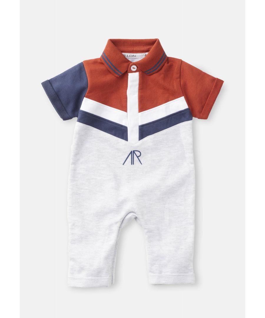 Sporty colour block on a super soft cotton jersey. With popper leg opening for easy fuss free dressing and logo print on the feet.. Angel & Rocket cares – made with fairtrade cotton. Colour:  . About me: 100% cotton. Look after me – Think planet. wash at 30c.